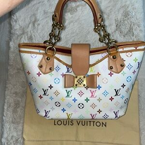 Authentic Louis Vuitton white multicolor Annie. Preowned with dustbag